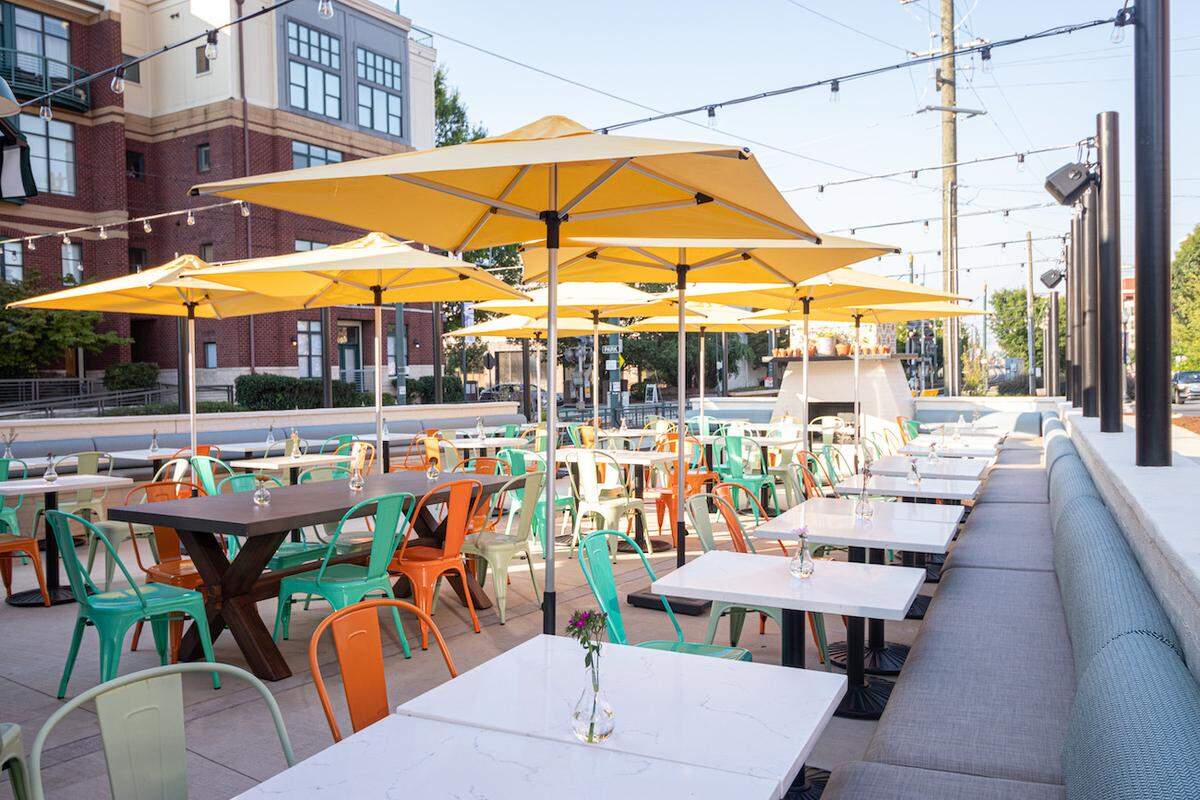Flower Child has a patio with views of Camden Road and the LYNX light rail.