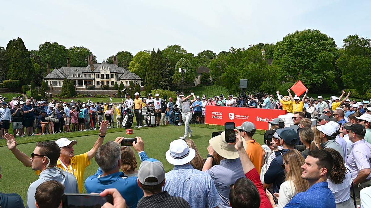 Fans gather around the 8th tee box to watch Jordan Spieth and other golfers tee off during second round action of the Wells Fargo Championship at Quail Hollow Club in Charlotte, NC on Friday, May 5, 2023. 