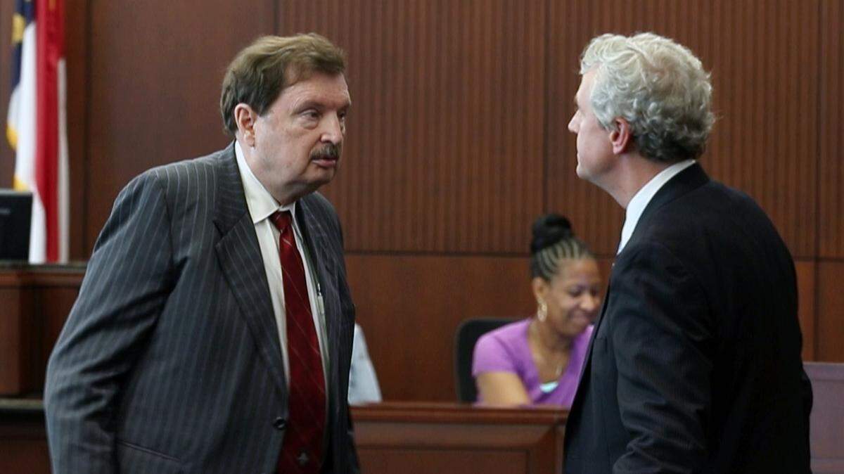 Former Sen. Fletcher Hartsell, left, was sentenced to prison over charges stemming from campaign finance irregularities.