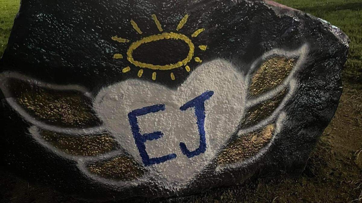 A memorial rock at Fairview Elementary School for a student who died. The school district’s protocol discourages permanent memorials.