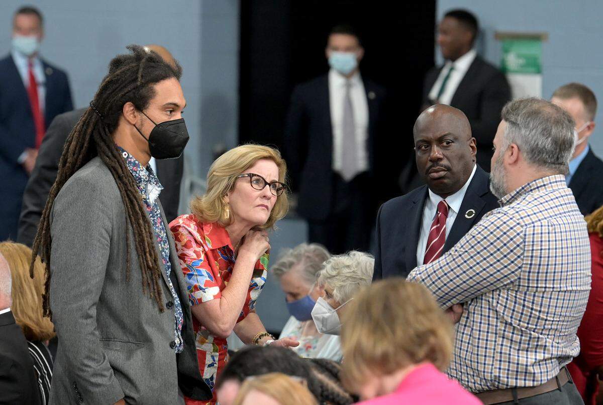 (L-R) Charlotte City Council members Braxton Winston, Julie Eiselt, Malcolm Graham and Larken Egleston gather while waiting for Vice President Kamala Harris to speak on the Affordable Connectivity Program (ACP) at the Carole A. Hoefener Community Services Center in Charlotte, NC on Thursday, July 21, 2022.