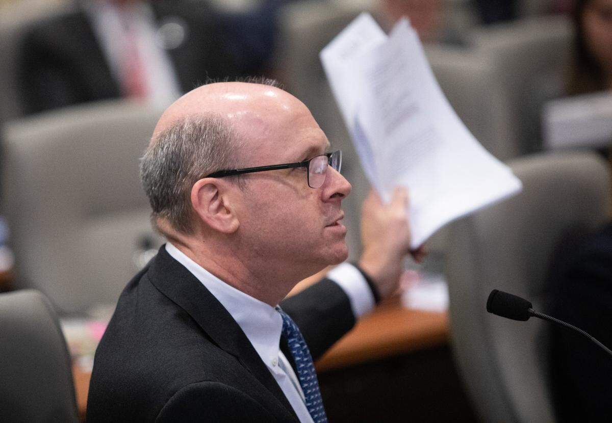 Marc Elias, an attorney for Democratic congressional candidate Dan McCready, expresses frustration after new documents were entered into evidence during the fourth day of a public evidentiary hearing on the 9th Congressional District voting irregularities investigation Thursday, Feb. 21, 2019, at the North Carolina State Bar in Raleigh.