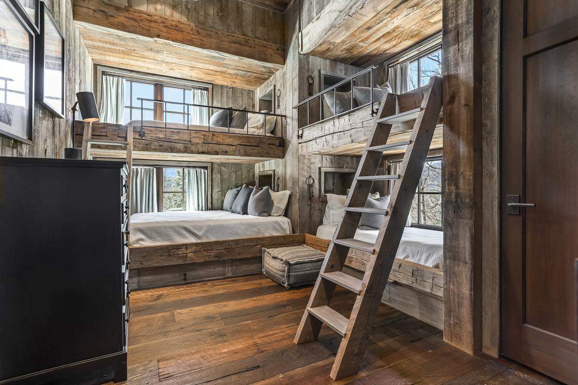 The home is nestled within the prestigious Mountaintop Golf & Lake Club in Cashiers, NC.