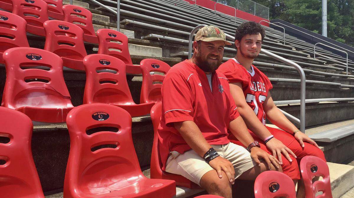Belmont South Point coach Adam Hodges (left) says offensive lineman Larry Dowdy is one of the best players he’s coached in 15 years at the school. Dowdy has committed to Georgia Tech.