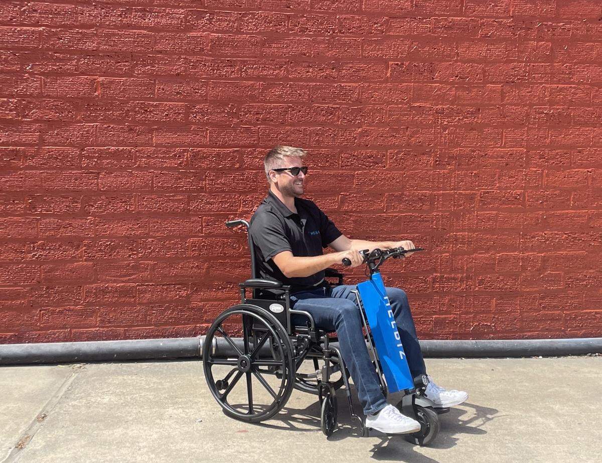 Helbiz’s debut of its scooter fleet includes free adaptive vehicles like a scooter attachment for wheelchairs.