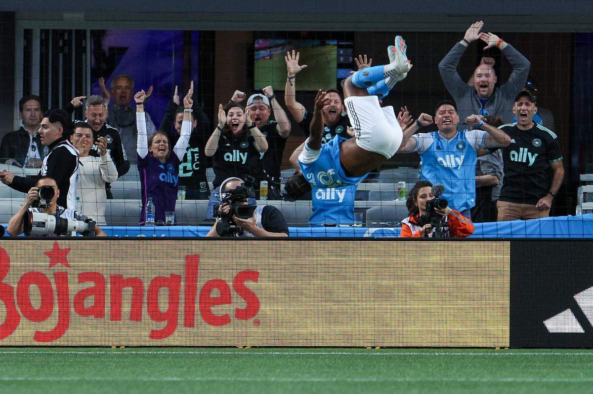 Fans react with jubilation as Charlotte FC forward Kerwin Vargas does a backflip after scoring a goal during the match against Inter Miami at Bank of America Stadium on Saturday, October 21, 2023 in Charlotte, NC. Charlotte FC held onto their lead to defeat Inter Miami, 1-0, clinching a spot in the playoffs.