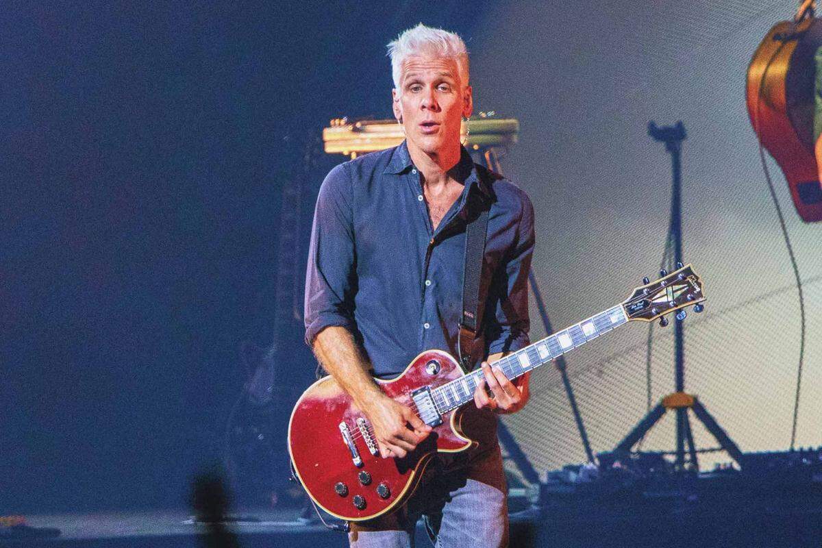 Kyle Cook in the midst of one of his many guitar solos at PNC Music Pavilion on Tuesday night.