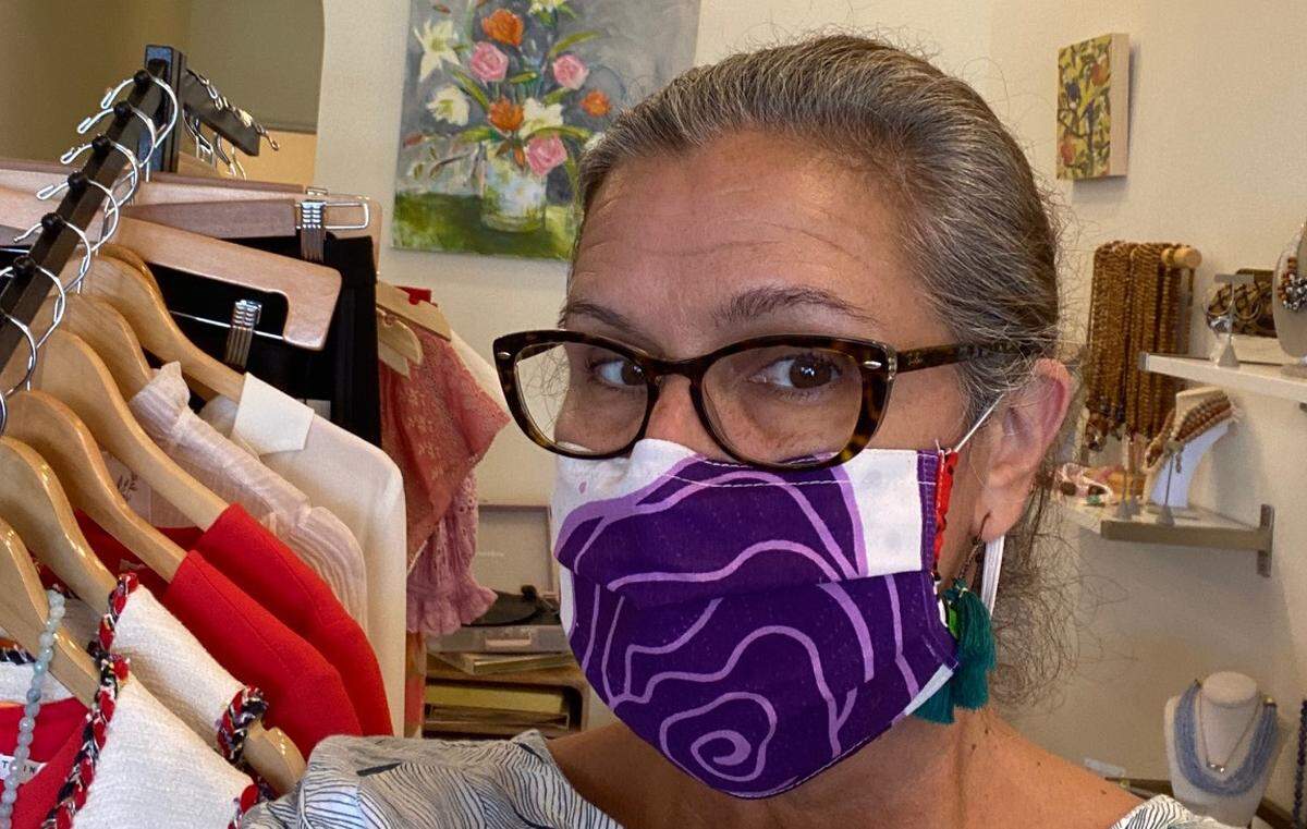 Christin Boone’s mask was made by refugee and immigrant artisans working with Charlotte nonprofit Empower for Hope.