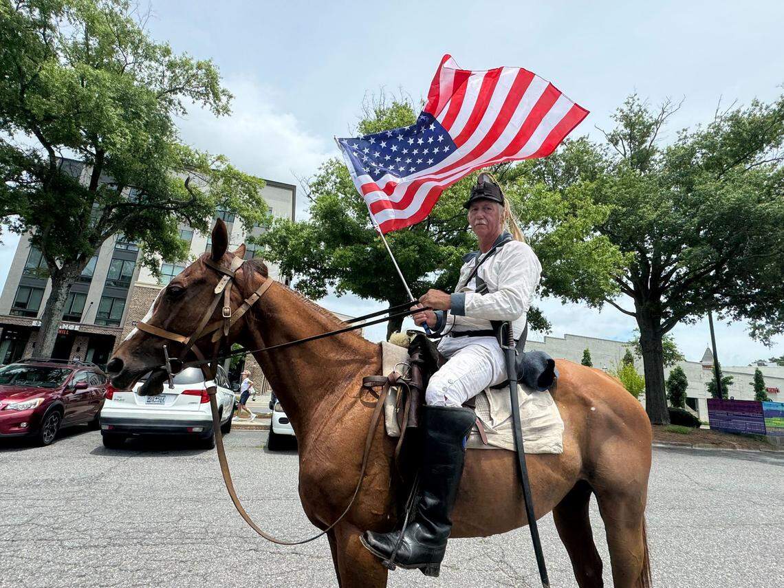 Protester Dean Withers, a Revolutionary War reenactor, at the Rock Hill “No Kings” protest. He drew comparisons between America’s initial fight for independence from the British throne and today’s fight against the Trump administration.