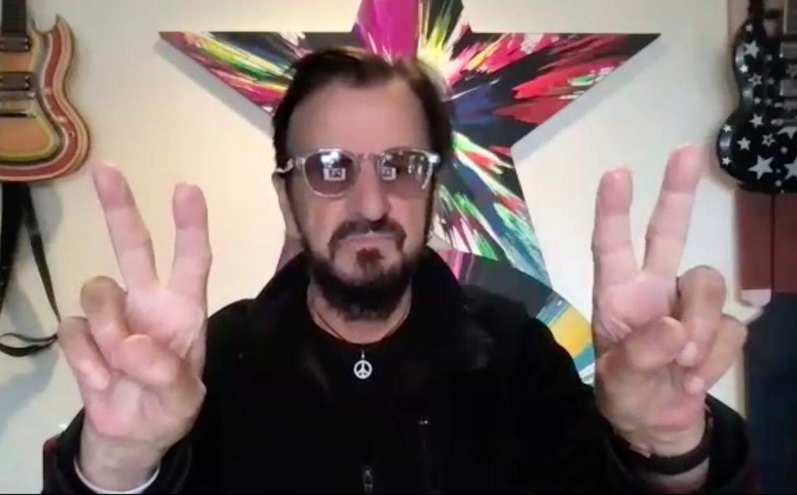 Ringo Starr answered reporters’ questions during a live, virtual interview earlier this year. He also frequently flashed the peace sign, part of his “Peace and Love” mantra.