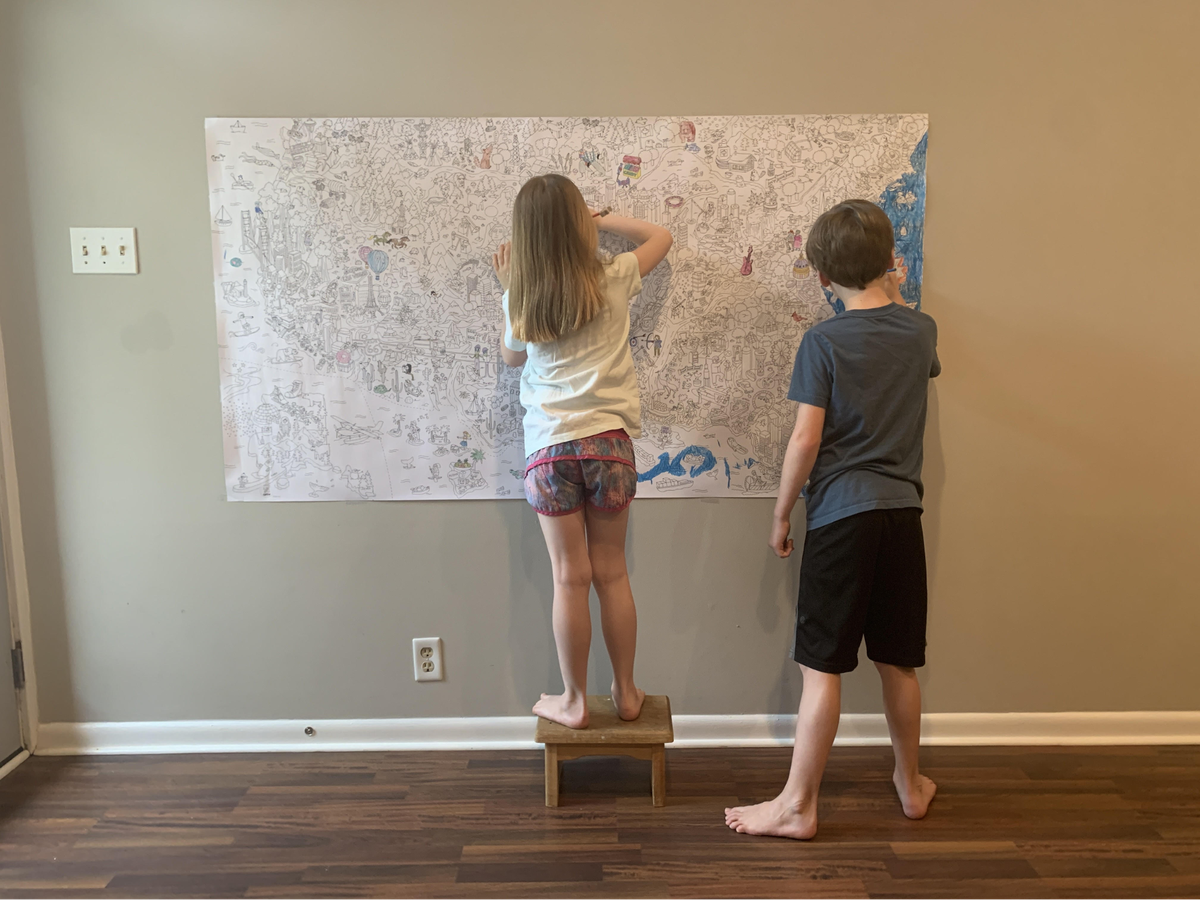 Siblings Finn and Eden Cramer combine geography and an art lesson.