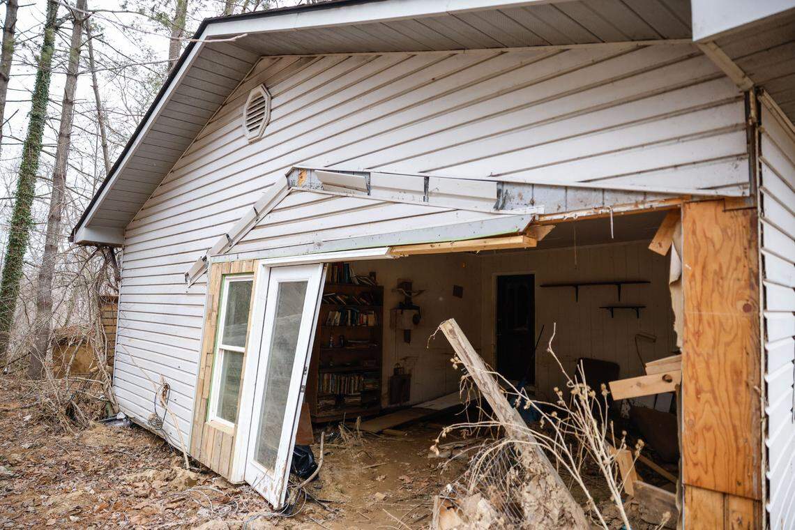 A gaping hole in the side of the house of Sabrina Mills exposes a room where the family used to gather, play games and watch television. Rising water pushed the Mills family’s house off its foundation. Their three-bedroom home destroyed, the family went to stay with Mills’ mother in Rock Hill. While there, thieves ransacked their flooded house, stealing jewelry, electronics and musical instruments, Mills said.