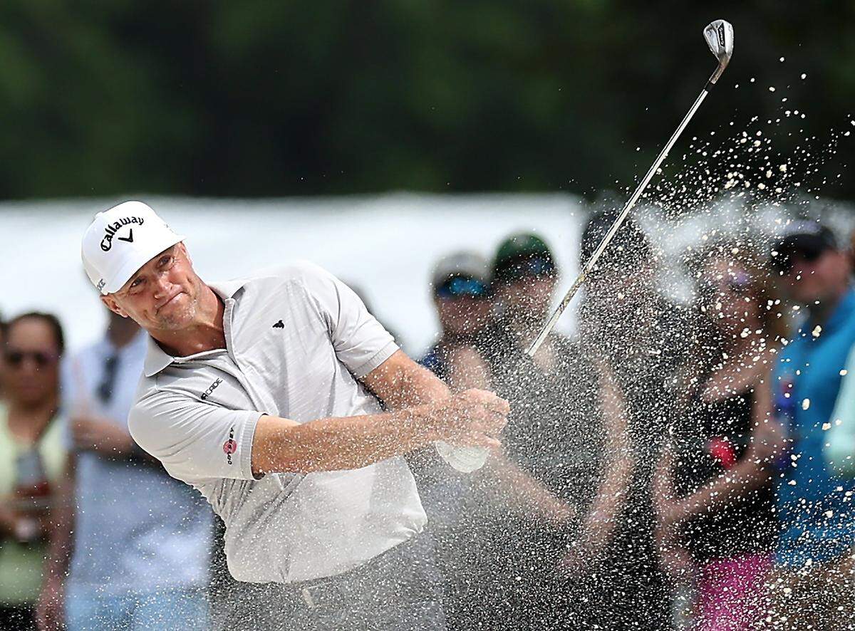 Alex Soren watches his second shot from a sand trap along the 10th fairway during second round action of the Wells Fargo Championship at Quail Hollow Club in Charlotte, NC on Friday, May 10, 2024.