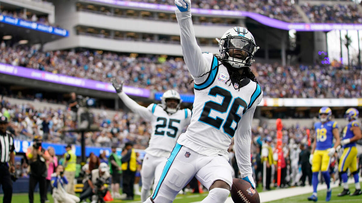 Carolina Panthers cornerback Donte Jackson celebrates after returning an intercepted pass for a touchdown during the first half of an NFL football game against the Los Angeles Rams Sunday, Oct. 16, 2022, in Inglewood, Calif. (AP Photo/Ashley Landis)