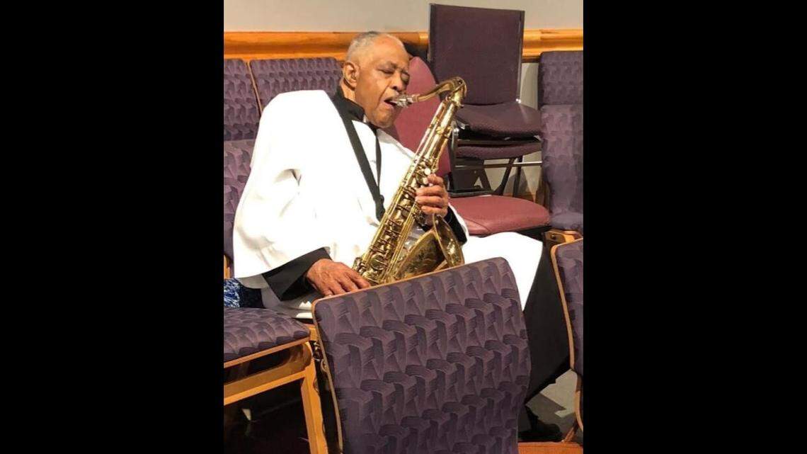 In this undated photo, Rev. Willis Hickerson Sr. plays his saxophone while dressed in his clergy attire.