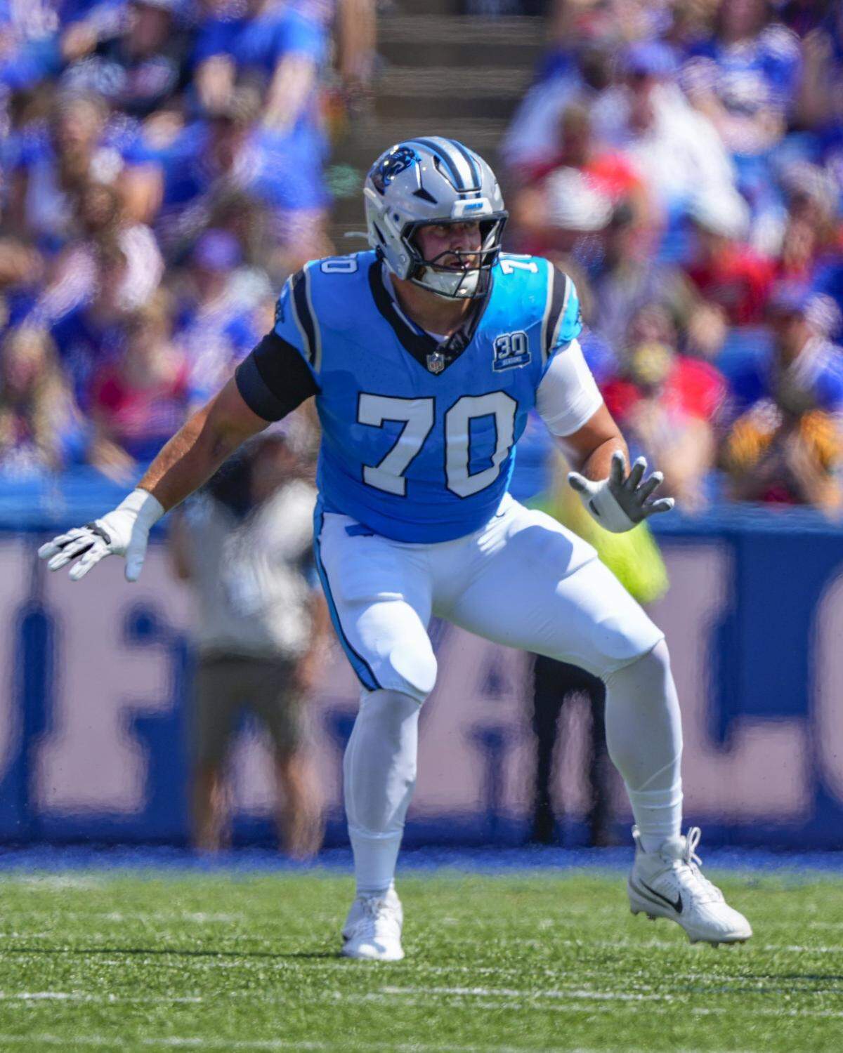Aug 24, 2024; Orchard Park, New York, USA; Carolina Panthers guard Brady Christensen (70) looks to block against the Buffalo Bills during the first half at Highmark Stadium. Mandatory Credit: Gregory Fisher-USA TODAY Sports