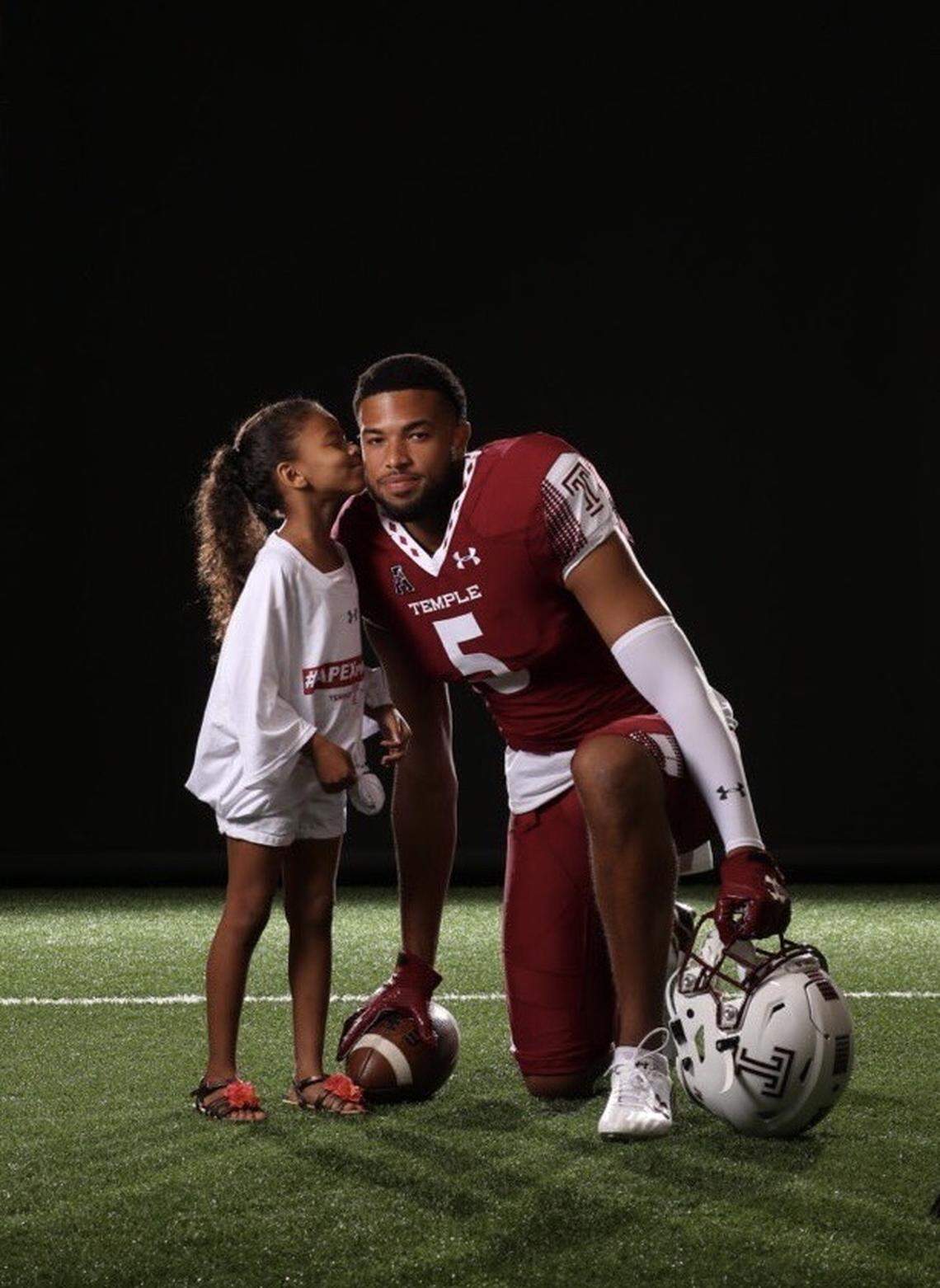 While in college at Temple, Keith Kirkwood had his daughter, Aria Nelson, join his senior photo shoot.