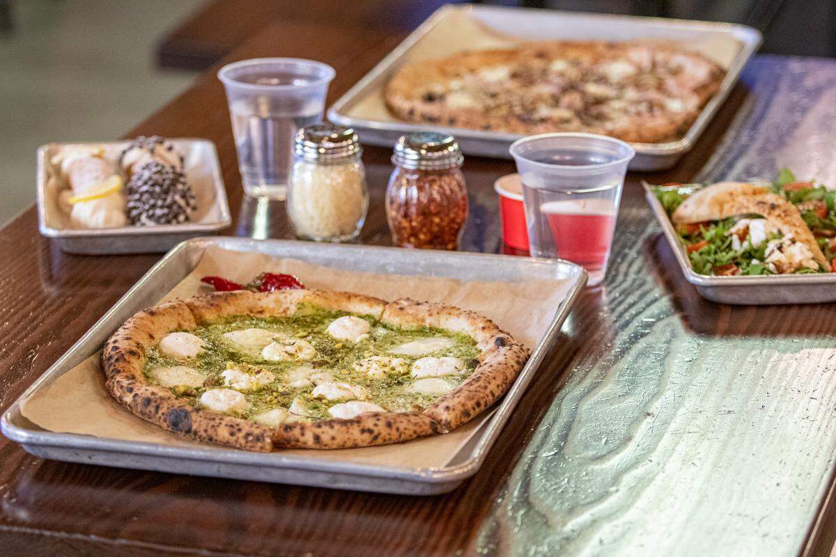 Inizio Pizza Napoletana Dilworth has a Pistacchio pie with buffalo mozzeralla, ricotta, and sea salt.