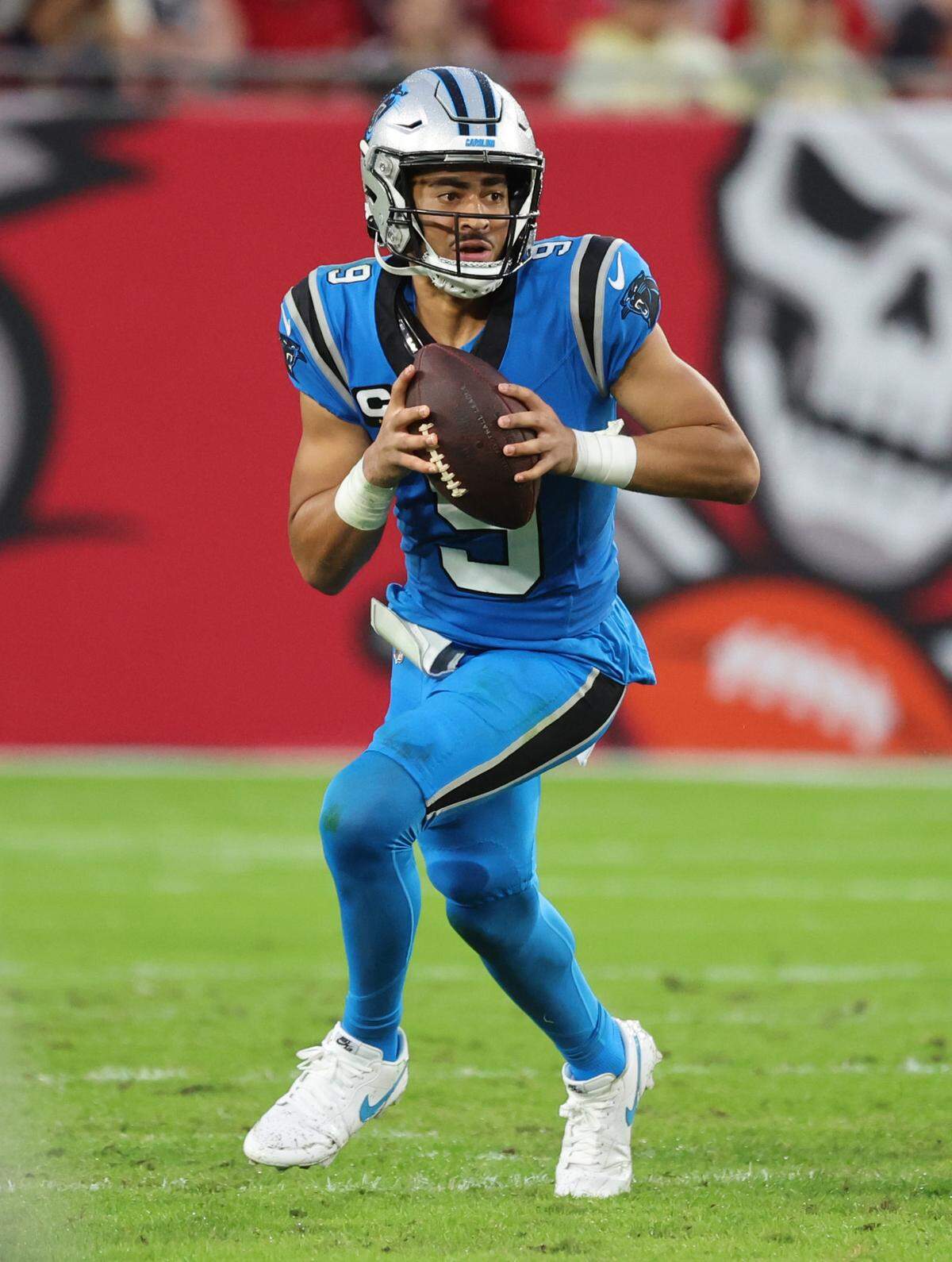 Dec 3, 2023; Tampa, Florida, USA; Carolina Panthers quarterback Bryce Young (9) runs out of the pocket against the Tampa Bay Buccaneers during the first half at Raymond James Stadium. Tampa Bay won, 21-18, dropping the Panthers to 1-11.