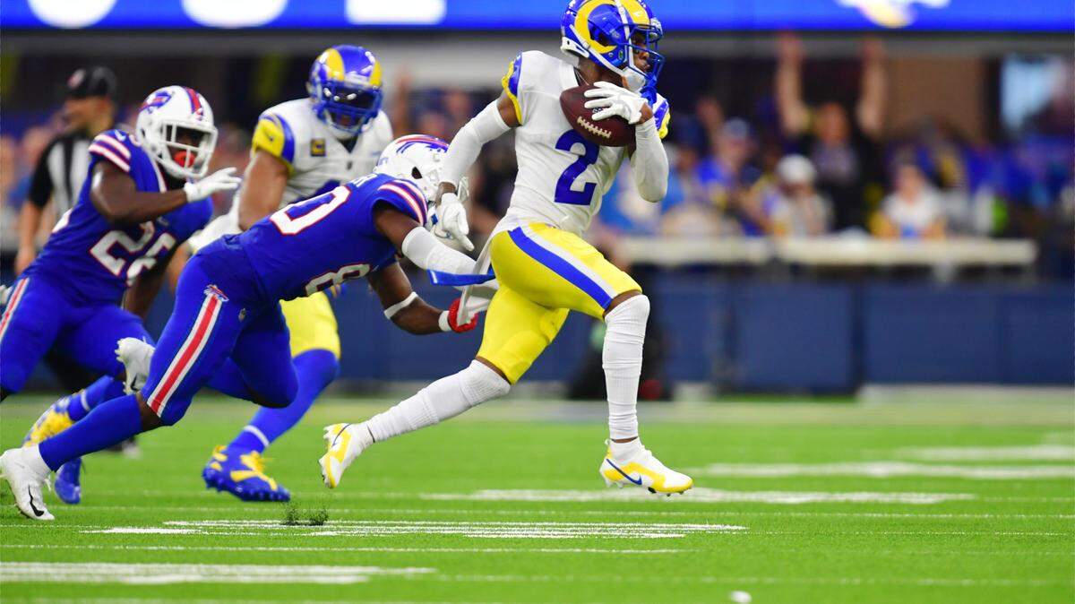 Los Angeles Rams cornerback Troy Hill (2) runs the ball for an interception in the second quarter at SoFi Stadium.