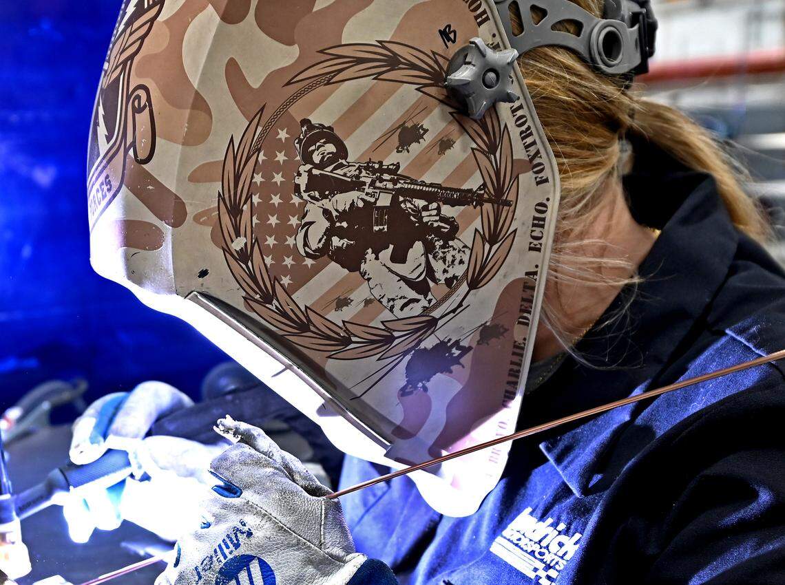 A welder works on materials at Hendrick Motorsports Technical Solutions facility in Concord, NC on Friday, March 7, 2025. The facility is assisting in the evolution of the Army ISV support project with GM defense that began in 2021.