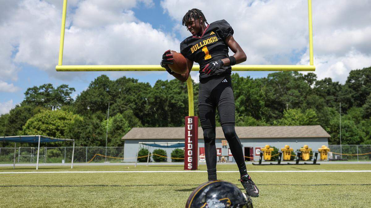 Jay M. Robinson wide receiver Brian Rowe, a top NC talent who has committed to the Univesrsity of South Carolina, poses for a portrait after practice in Concord, NC on Tuesday, July 23, 2024.