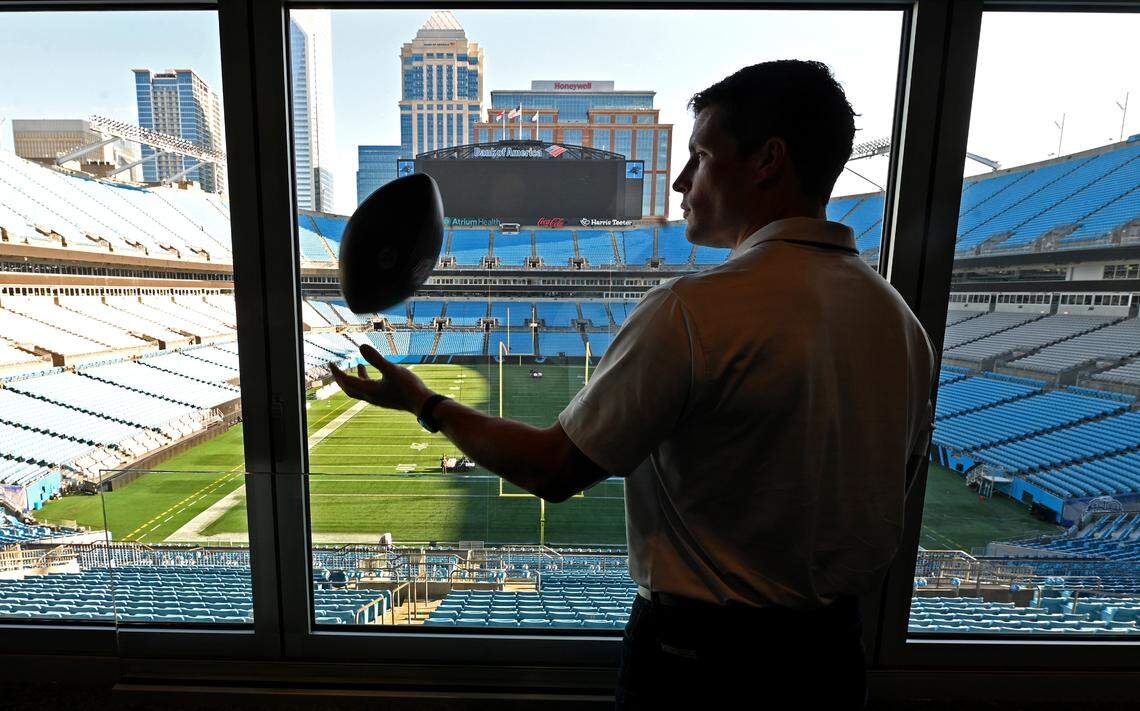 Former Carolina Panthers linebacker Luke Kuechly gazes out at Bank of America Stadium. He can still pick out the seats in Section 346 where his parents sat for every home game.