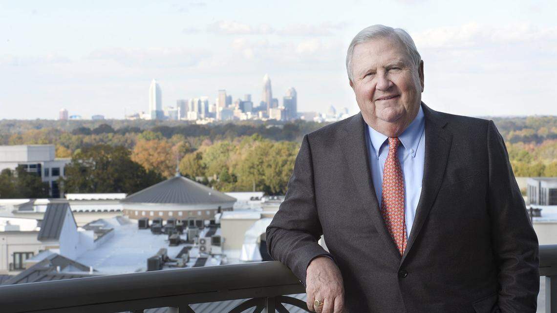 Johnny Harris at the headquarters of Lincoln Harris, with uptown Charlotte in the background.