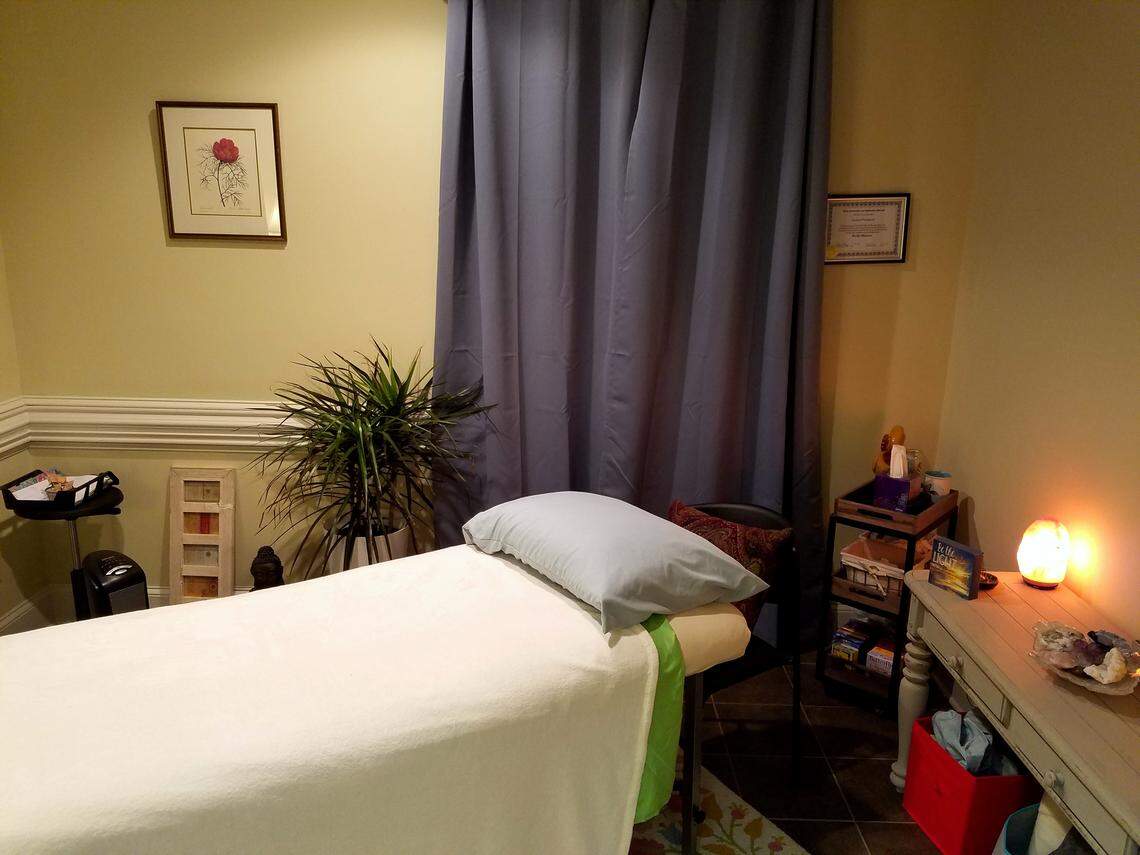 Queen City Yoga Center embraces a variety of wellness practices, such as Reiki, an ancient form of energy healing, to complement yoga classes.
