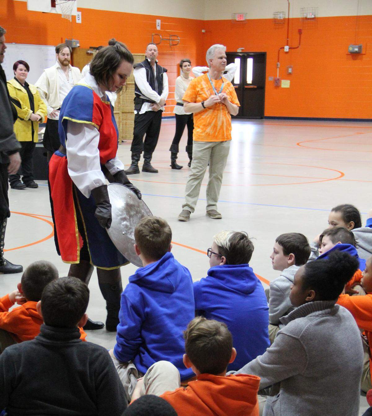In January, members of Free Reign Theatre took a shortened version of “They Fight” to Andrew Jackson Middle School. The play was a compilation of the best battles, brawls and sword fights from Shakespeare. Students got to talk with cast members and learn about stage combat. Picture here are Free Reign cast member Amy Scheide Cheek and middle school drama teacher Harold Skinner.
