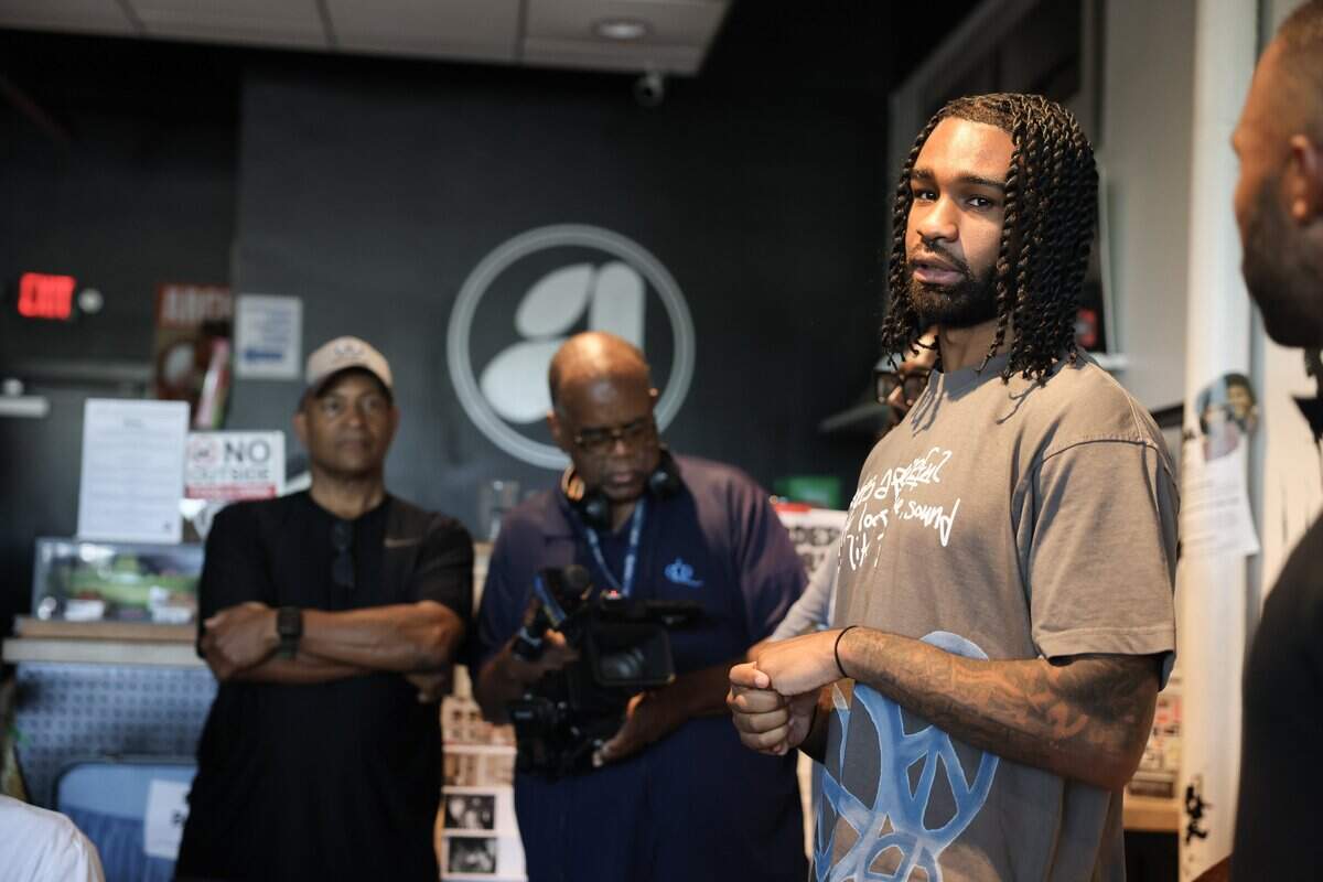 Charlotte Hornets guard Coby White talks to a crowd Tuesday, July 7, 2026 at Archive CLT in Charlotte.