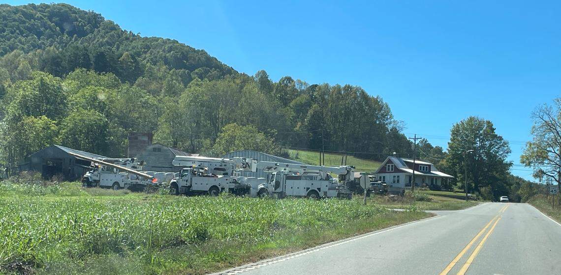 Duke Energy lineman gather, working to restore power after Hurricane Helene.