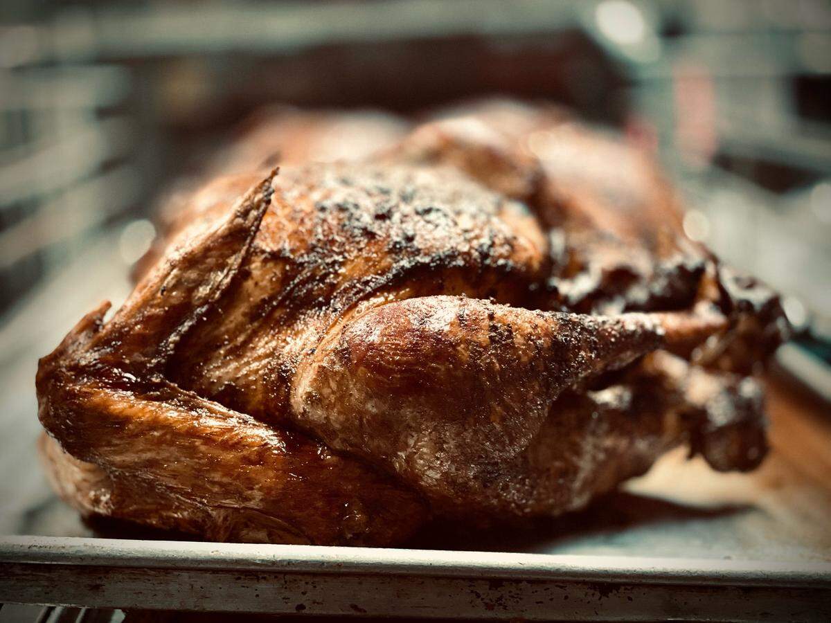 Mac’s Speed Shop is selling smoked turkeys a la carte for $70, along with full meals for Thanksgiving pre-orders this year.