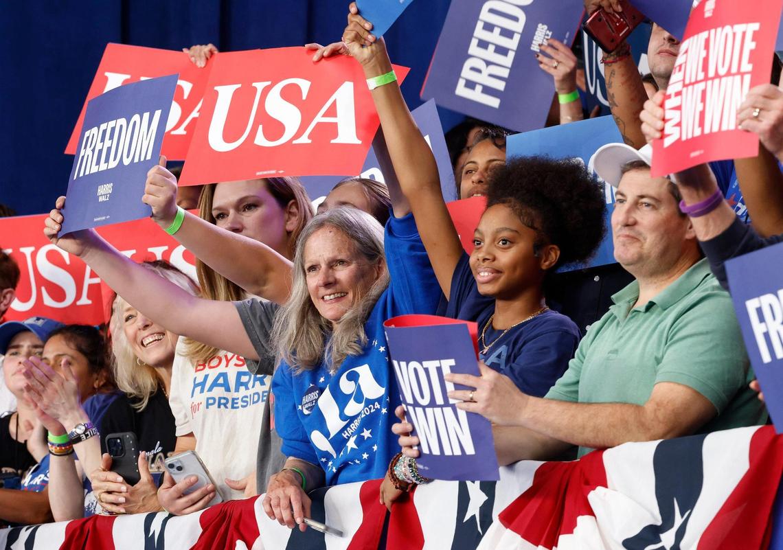 Supporters listen and show support for Vice President Kamala Harris during a rally at PNC Music Pavilion on Saturday, November 2, 2024.