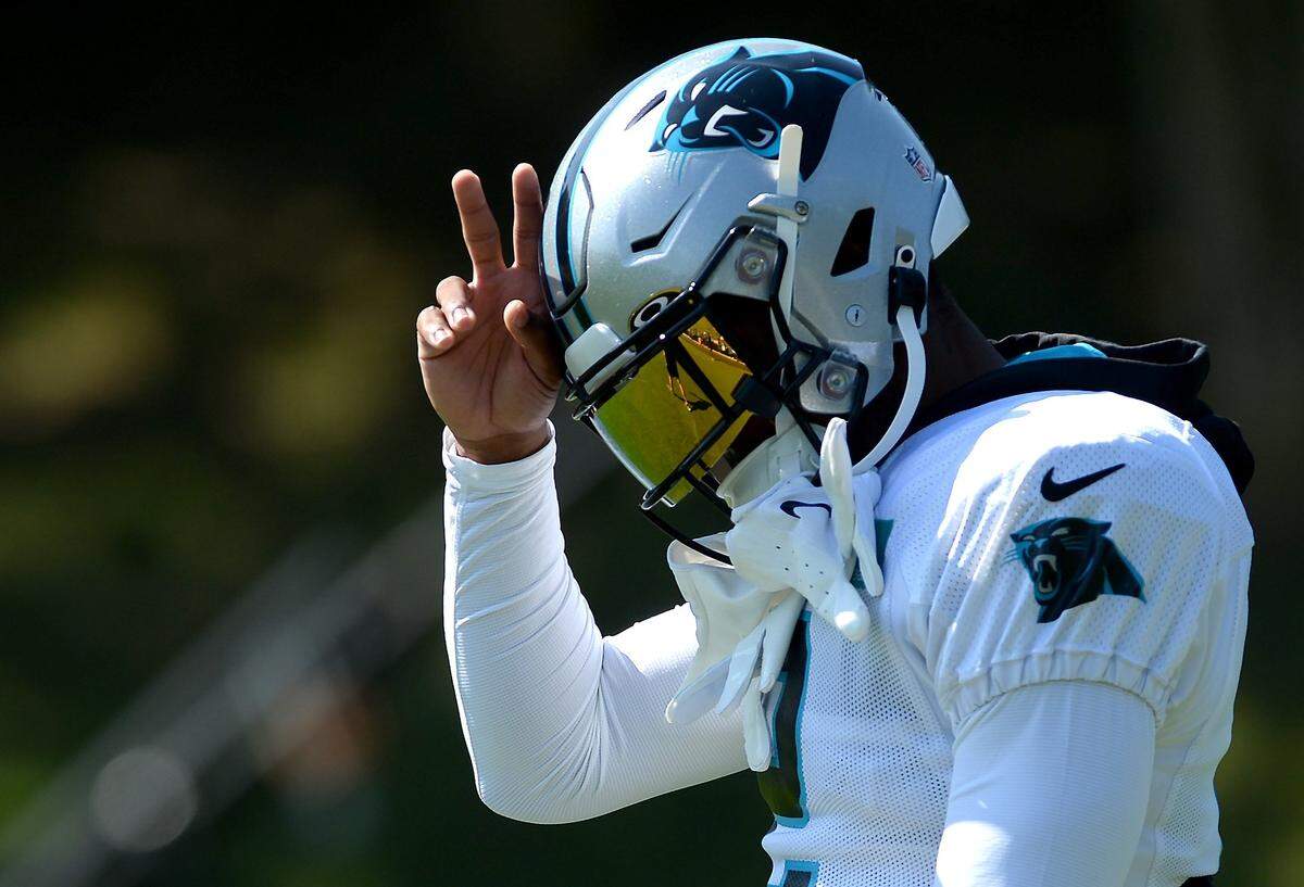 Carolina Panthers wide receiver DJ Moore gestures to the fans as he walks to practice on Monday, August 8, 2022 at Wofford College in Spartanburg, SC.