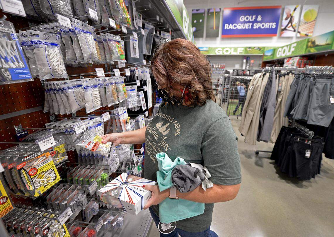 Barnes drew the name of a co-worker who loves golf in the company Christmas gift program.