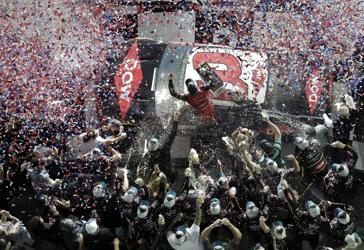 Austin Dillon, center, celebrates on his car with crew members in Victory Lane after winning the Daytona 500. The victory put the No. 3 back in the spotlight, but it wasn't without controversy.