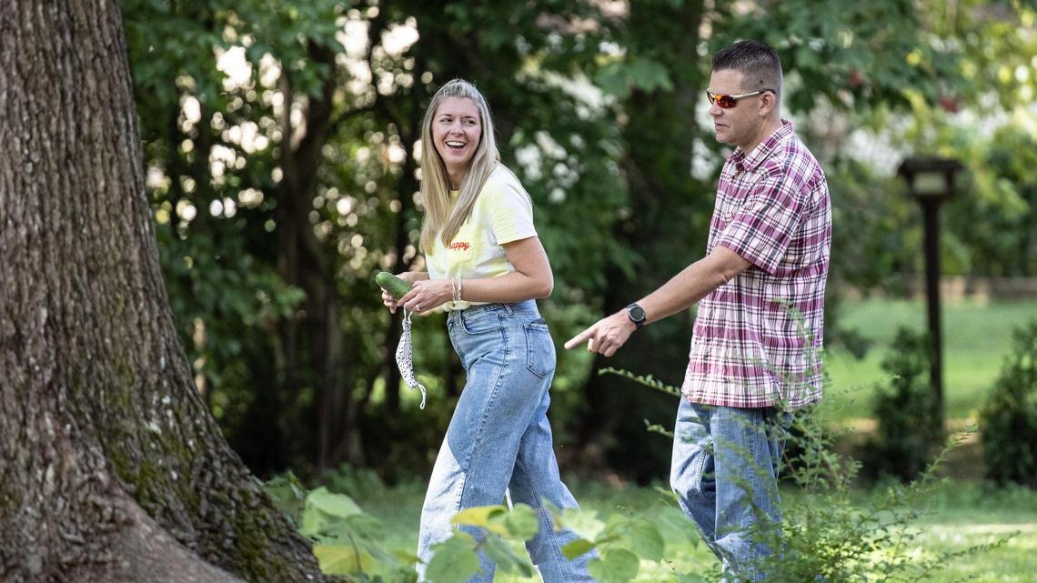 Half-siblings Natalie Friedl and Ryan Krok outside of her family’s Huntersville home, about an hour after he arrived in Charlotte for his first visit with her family.