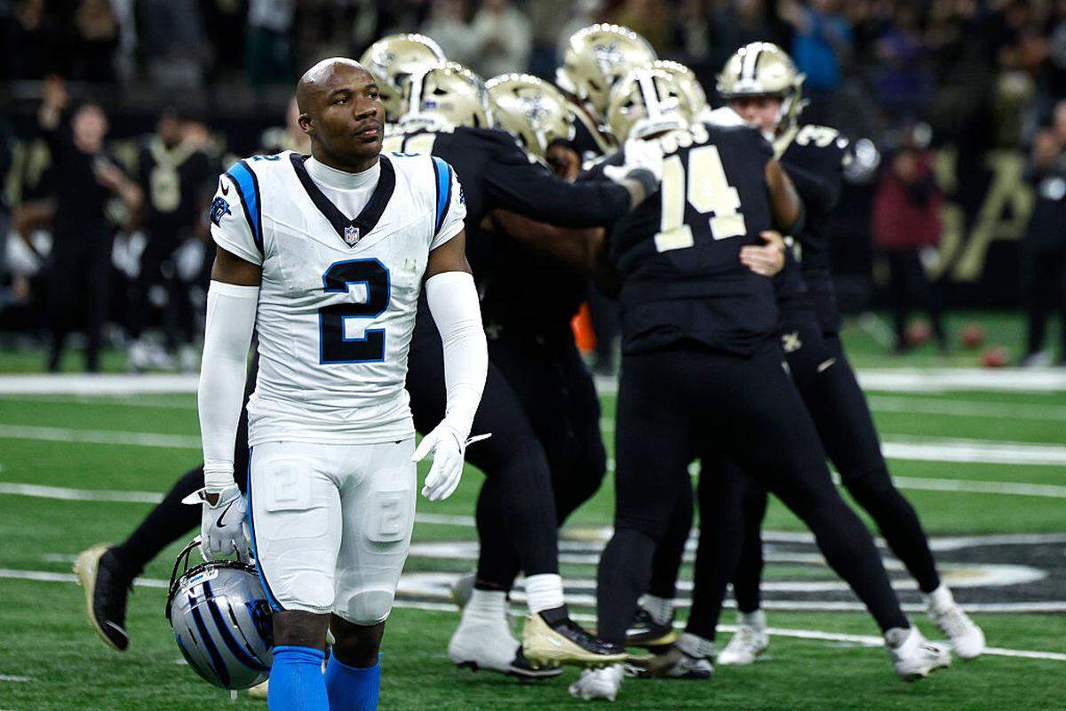Mike Jackson of the Carolina Panthers reacts as the New Orleans Saints celebrate the game-winning field goal kicked by Charlie Smyth (39) during Sunday’s fourth quarter at Caesars Superdome.