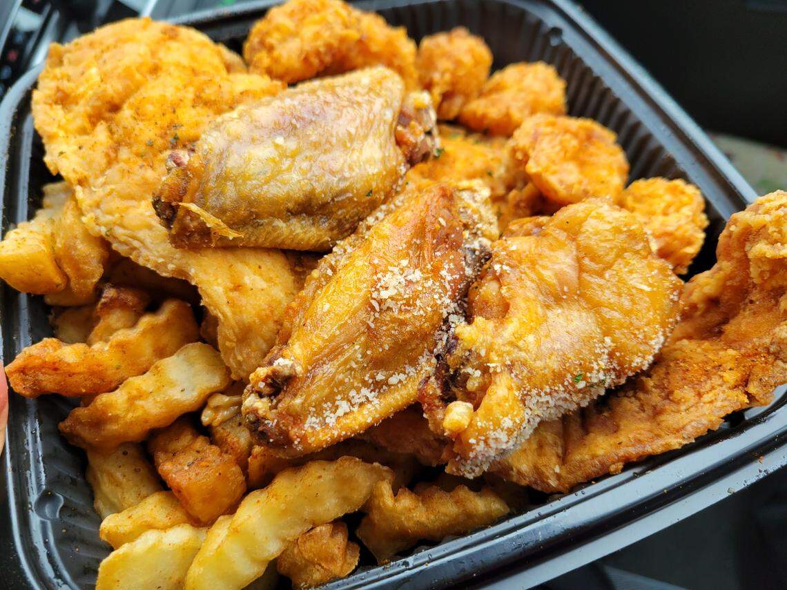 Chicken wings, fish and fries from Cuzzo’s Cuisine. 