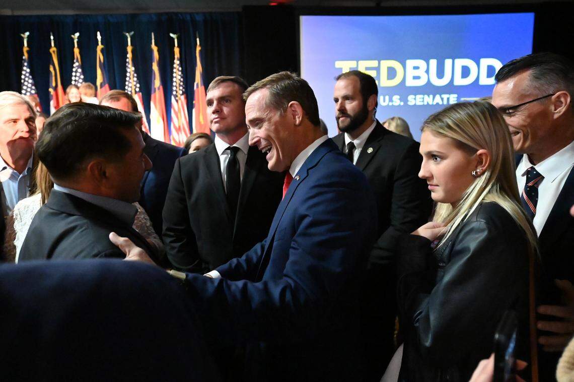 Rep. Ted Budd speaks with a supporter following his victory speech on Tuesday, November 8, 2022. Budd defeated Cheri Beasley for the U.S. Senate.