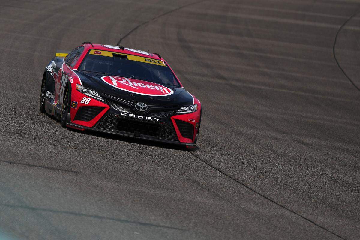 Oct 22, 2023; Homestead, Florida, USA; NASCAR Cup Series driver Christopher Bell (20) races during the 4EVER 400 presented by Mobil 1 at Homestead-Miami Speedway. Mandatory Credit: Jasen Vinlove-USA TODAY Sports
