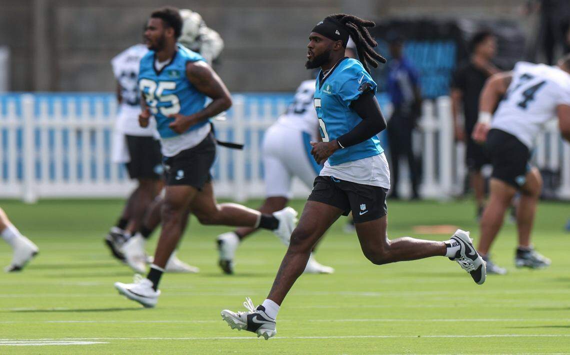 Panthers wide receiver Diontae Johnson jogs back to the sideline during day one of training camp practice in Charlotte, NC on Wednesday, July 24, 2024.