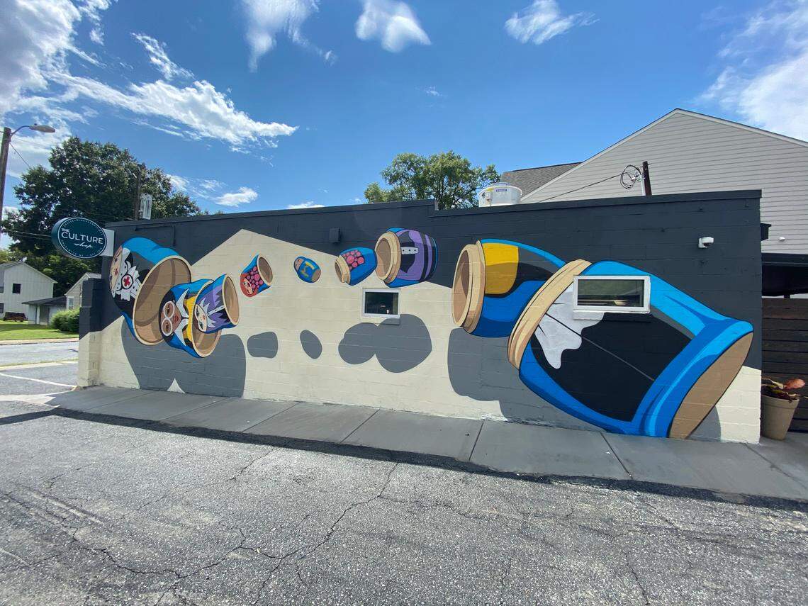 Matt Hooker’s mural on the side of The Culture Shop.