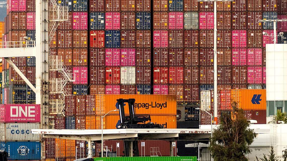 Shipping containers are stacked and waiting at the Port of Oakland. Supply chain issues and delays are hurting smaller businesses and causing consumers to face higher prices this holiday season., and California members of Congress are pushing to ease the crisis.