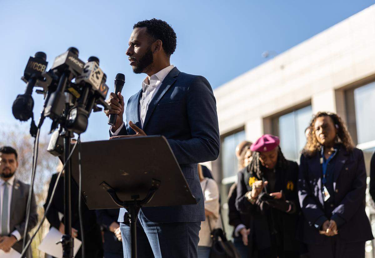 Senator Caleb Theodros speaks during a press conference with local and state leaders regarding the reported deployment of federal immigration enforcement personnel to Charlotte at the Charlotte-Mecklenburg Government Center in Charlotte, N.C., on Friday, November 14, 2025.