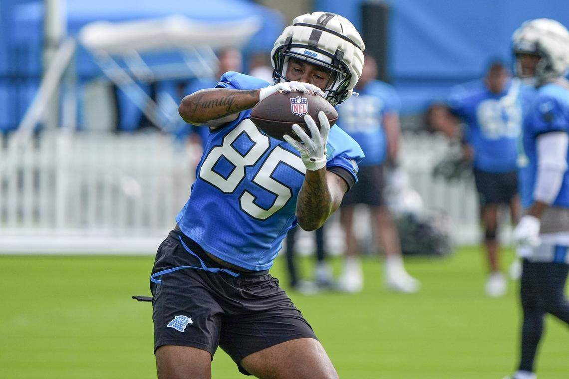 Jul 24, 2024; Charlotte, NC, USA; Carolina Panthers tight end Ja'Tavion Sanders (85) makes a catch at Carolina Panthers Practice Fields. Mandatory Credit: Jim Dedmon-USA TODAY Sports