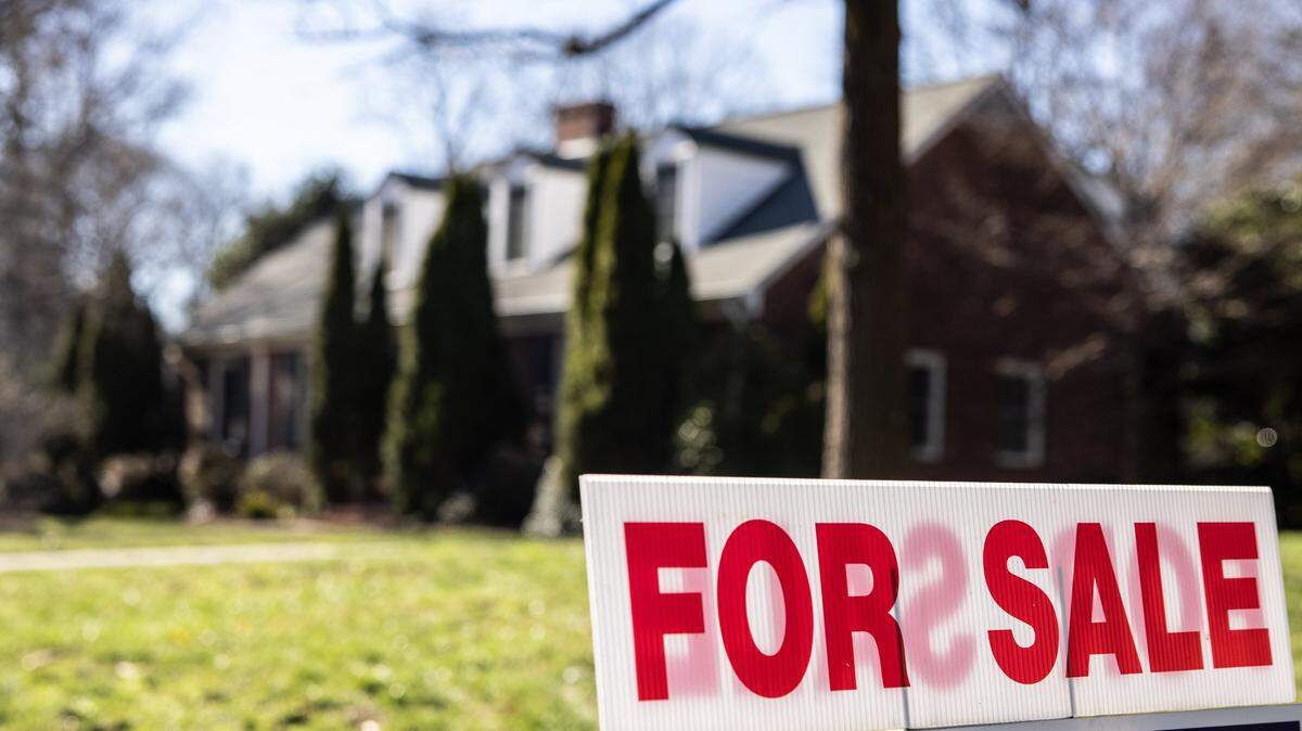 A real estate for sale sign in Charlotte, N.C., on Tuesday, December 5, 2022.