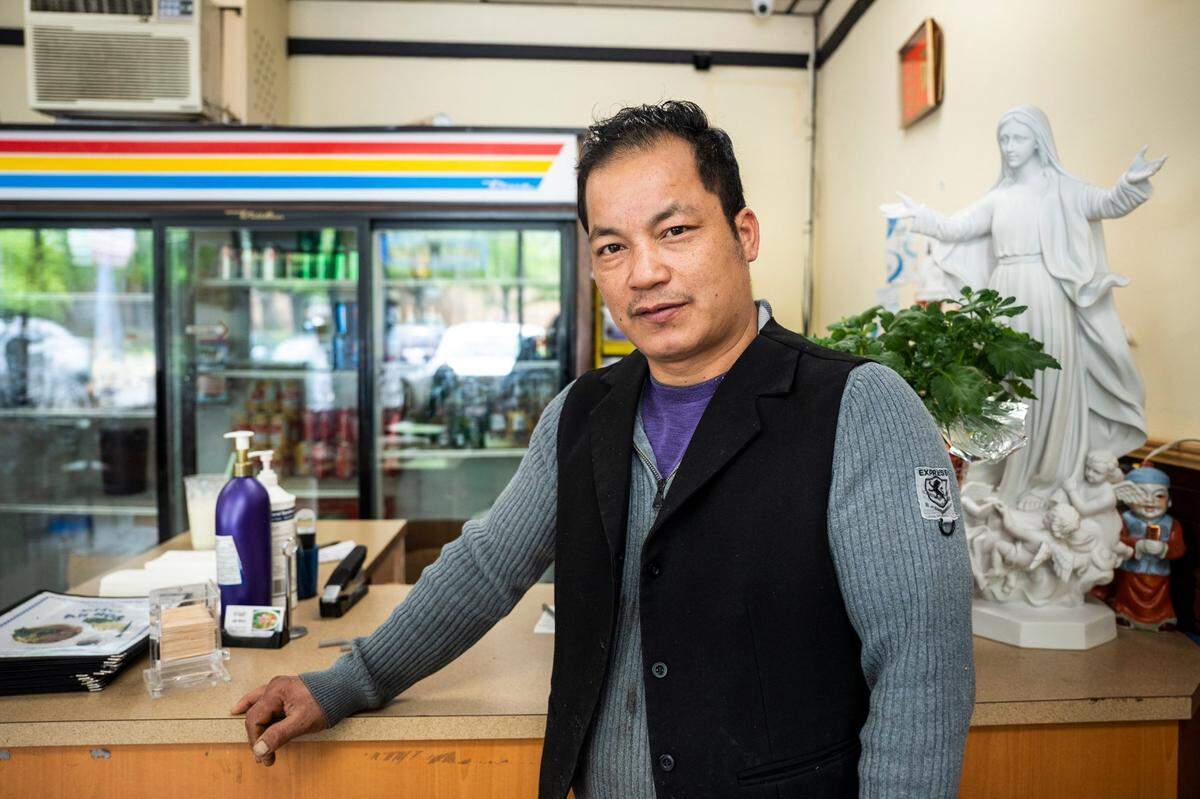Tiep Pham, owner of Pho An Hoa, poses for a portrait inside his Central Avenue restaurant. 