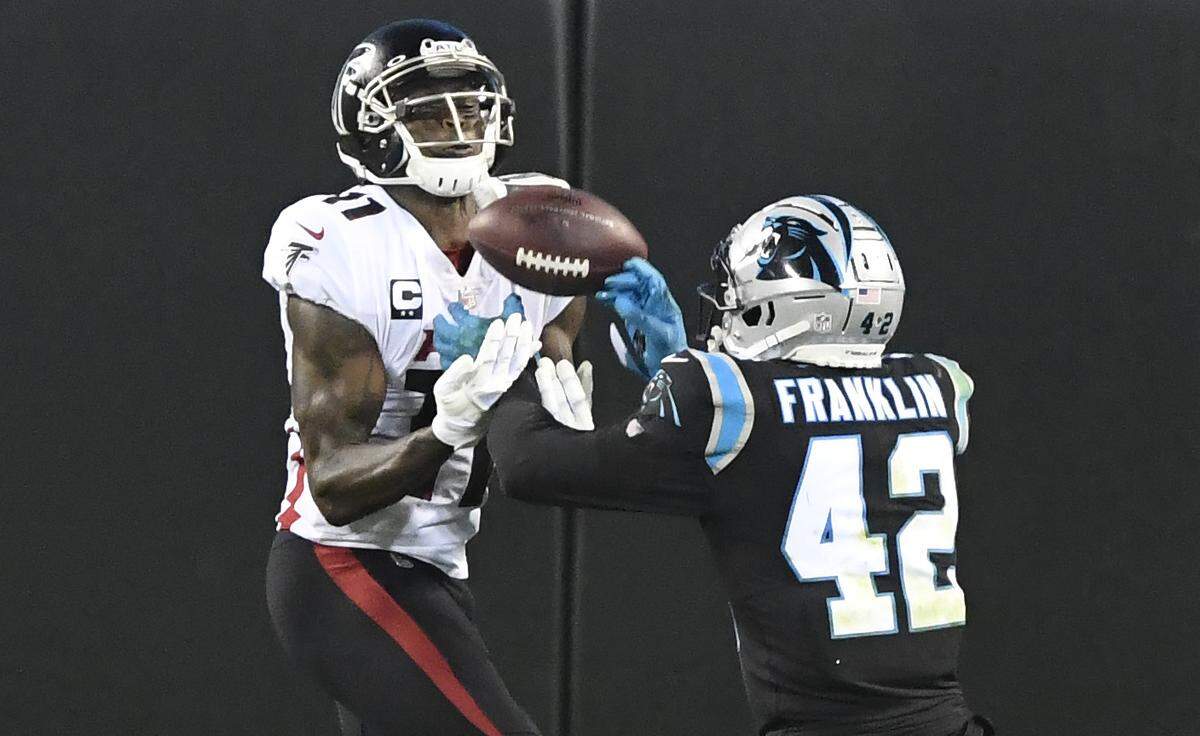 Carolina Panthers safety Sam Franklin (42) breaks up a potential touchdown pass to Atlanta Falcons wide receiver Julio Jones (11) in first half action Thursday, October 29, 2020.
